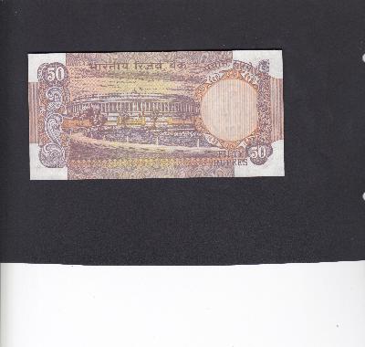 Beschrijving achterzijde: ARMS